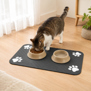 Black absorbent pet feeding mat used with food and water bowls